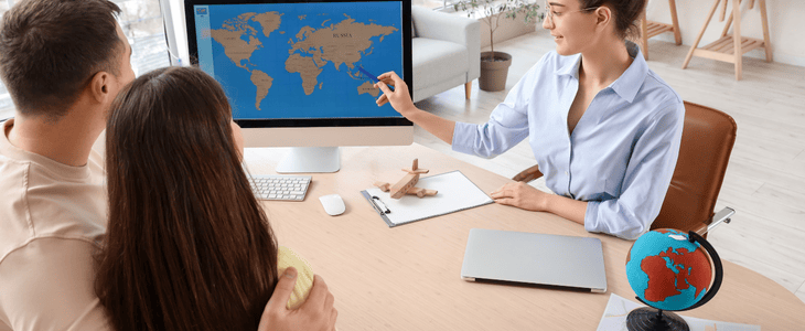 travel agent greeting clients
